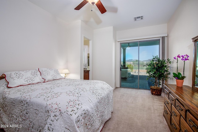 carpeted bedroom featuring ceiling fan and access to exterior