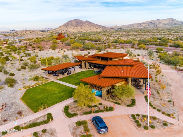 drone / aerial view featuring a mountain view