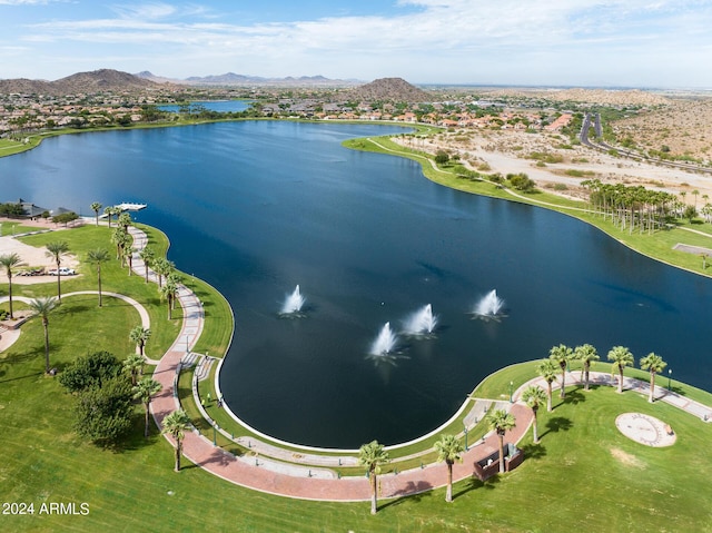 aerial view featuring a water and mountain view