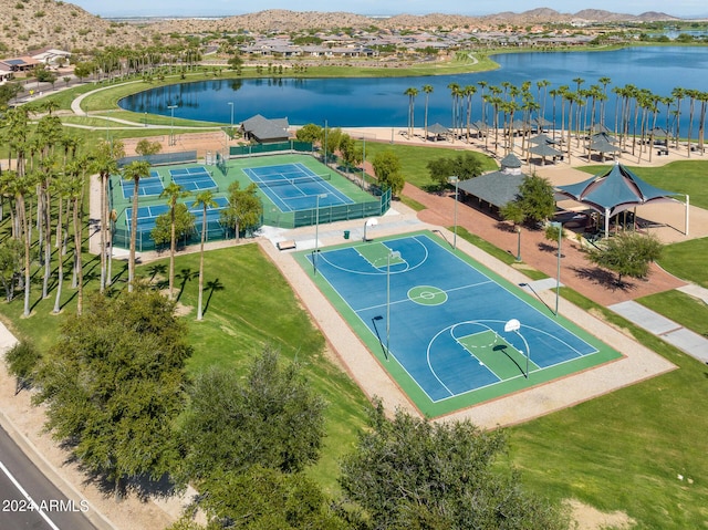 birds eye view of property featuring a water and mountain view