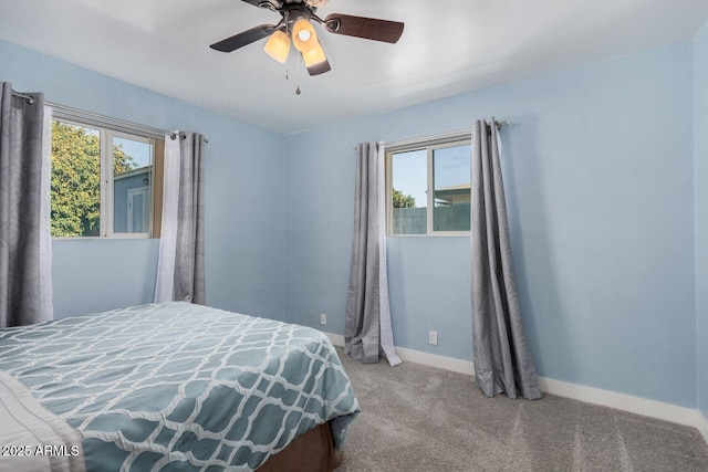 bedroom featuring ceiling fan and carpet flooring