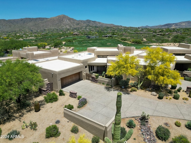 drone / aerial view featuring a mountain view