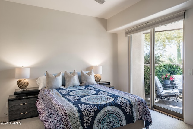 carpeted bedroom with access to exterior