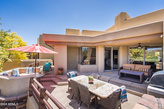 view of patio / terrace featuring an outdoor living space and ceiling fan