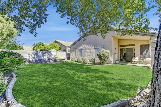 view of yard with a patio area