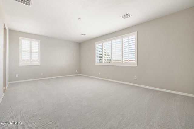 20473 W Legend Trl, Buckeye, AZ 85396 - unfurnished room with baseboards and carpet floors