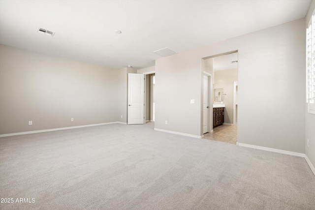 20473 W Legend Trl, Buckeye, AZ 85396 - empty room featuring light carpet and baseboards