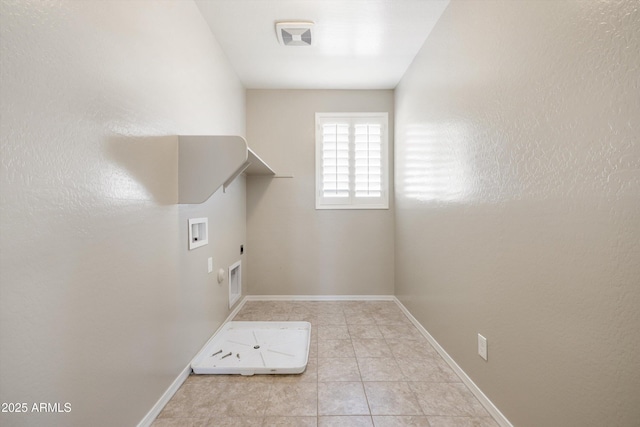 20473 W Legend Trl, Buckeye, AZ 85396 - washroom featuring washer hookup, electric dryer hookup, baseboards, and tile patterned flooring