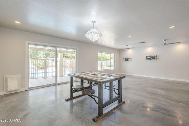 5330 E Tierra Buena Ln, Scottsdale, AZ 85254 - dining area with concrete flooring, baseboards, recessed lighting, a chandelier, and a ceiling fan