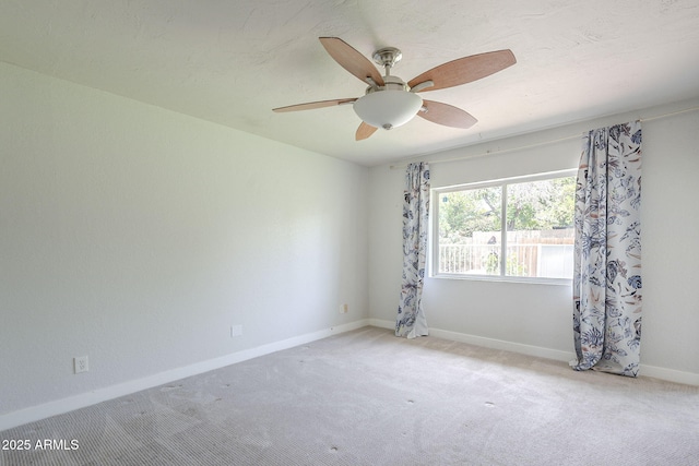 5330 E Tierra Buena Ln, Scottsdale, AZ 85254 - carpeted empty room featuring a ceiling fan and baseboards