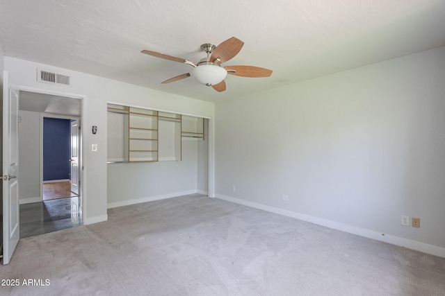 5330 E Tierra Buena Ln, Scottsdale, AZ 85254 - unfurnished bedroom featuring a closet, carpet, baseboards, and a ceiling fan