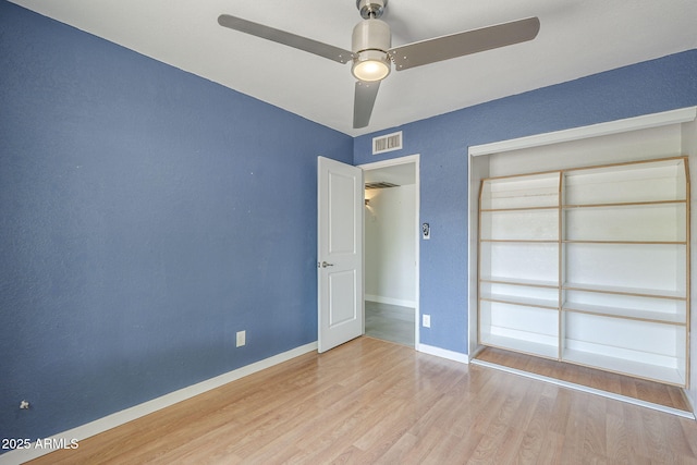 5330 E Tierra Buena Ln, Scottsdale, AZ 85254 - spare room featuring wood finished floors, baseboards, and a ceiling fan