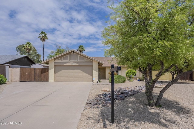 5330 E Tierra Buena Ln, Scottsdale, AZ 85254 - view of front of house featuring driveway, an attached garage, fence, and stucco siding