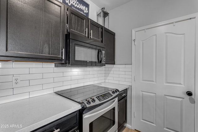 kitchen with backsplash and electric range