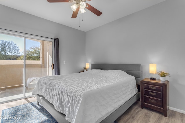 bedroom with access to outside, ceiling fan, and wood-type flooring