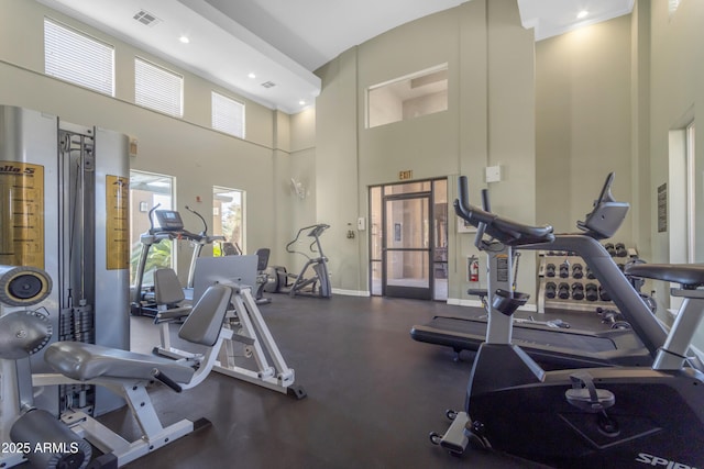 gym with a high ceiling