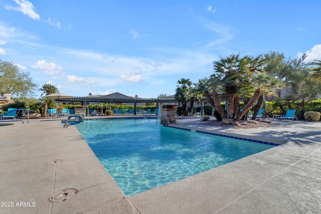 view of swimming pool with a patio