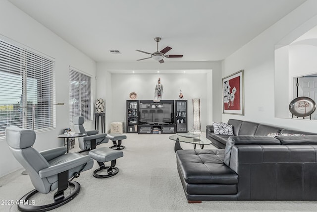 582 W Stirrup Ln, San Tan Valley, AZ 85143 - living room with a ceiling fan, visible vents, and carpet