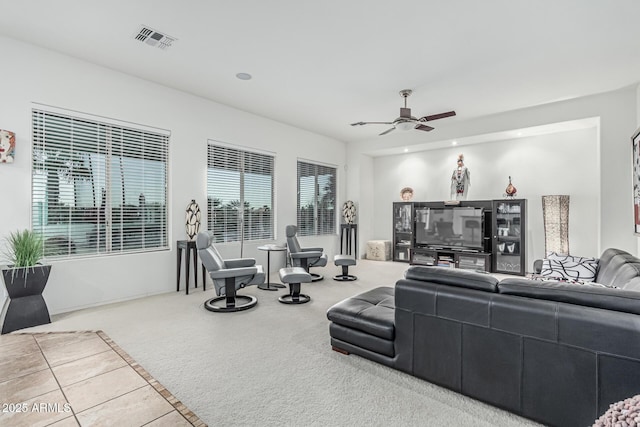 582 W Stirrup Ln, San Tan Valley, AZ 85143 - living room with a ceiling fan, visible vents, and carpet