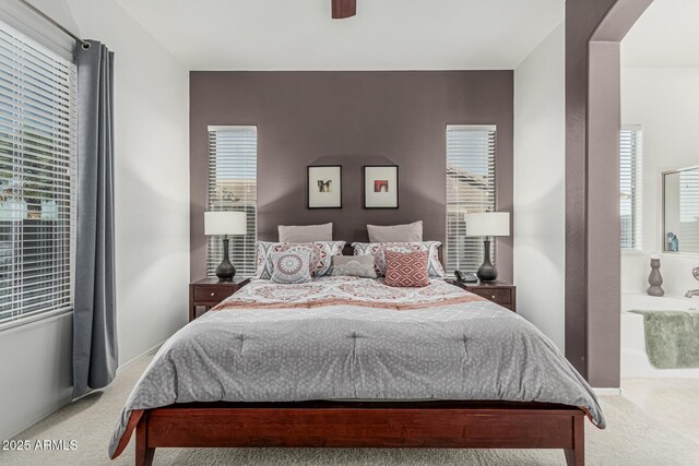 582 W Stirrup Ln, San Tan Valley, AZ 85143 - carpeted bedroom with arched walkways and ceiling fan