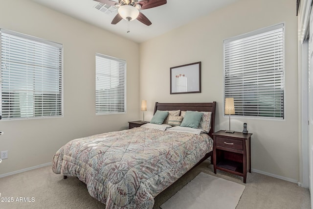 582 W Stirrup Ln, San Tan Valley, AZ 85143 - carpeted bedroom with baseboards, a ceiling fan, and visible vents