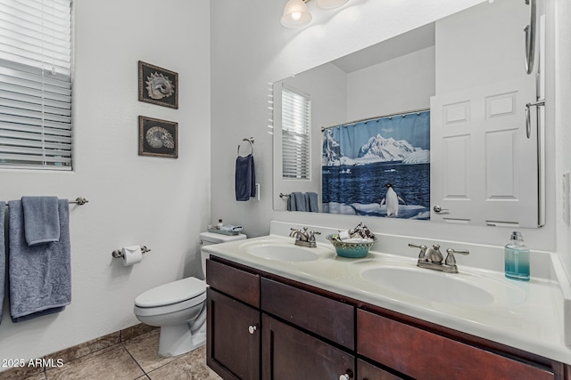 582 W Stirrup Ln, San Tan Valley, AZ 85143 - full bath with toilet, tile patterned flooring, a sink, and double vanity