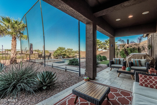582 W Stirrup Ln, San Tan Valley, AZ 85143 - view of patio featuring an outdoor living space, a fenced backyard, and a community pool