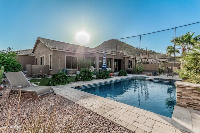 582 W Stirrup Ln, San Tan Valley, AZ 85143 - exterior space featuring a patio area, a fenced in pool, and a fenced backyard