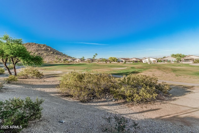 582 W Stirrup Ln, San Tan Valley, AZ 85143 - surrounding community with a residential view and a lawn