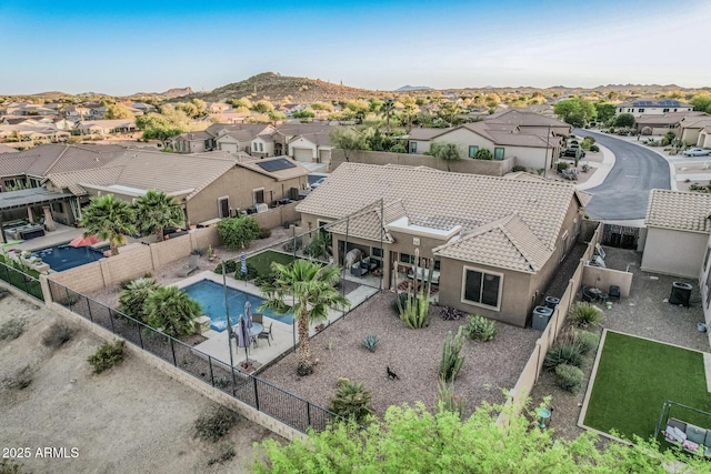 582 W Stirrup Ln, San Tan Valley, AZ 85143 - drone / aerial view with a residential view and a mountain view
