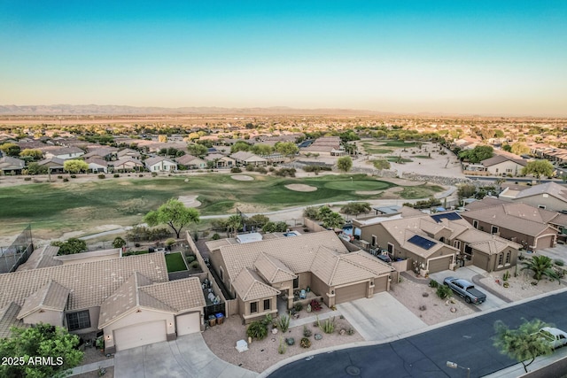 582 W Stirrup Ln, San Tan Valley, AZ 85143 - aerial view at dusk with a residential view, golf course view, and a mountain view