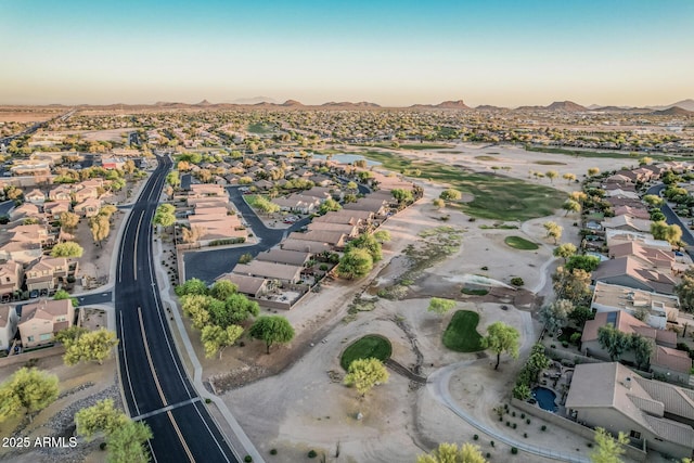 582 W Stirrup Ln, San Tan Valley, AZ 85143 - aerial view at dusk with a residential view and a mountain view