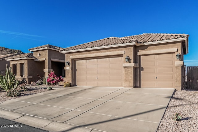 582 W Stirrup Ln, San Tan Valley, AZ 85143 - view of front of property featuring stucco siding, a tile roof, driveway, and a garage