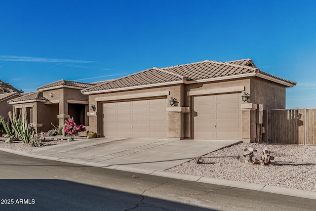582 W Stirrup Ln, San Tan Valley, AZ 85143 - view of front of house with stucco siding, a tile roof, concrete driveway, and a garage