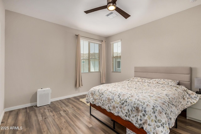 1153 W Diamondback Dr, Chandler, AZ 85286 - bedroom featuring wood finished floors, baseboards, and a ceiling fan