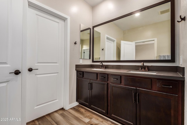 1153 W Diamondback Dr, Chandler, AZ 85286 - bathroom with wood finished floors and double vanity