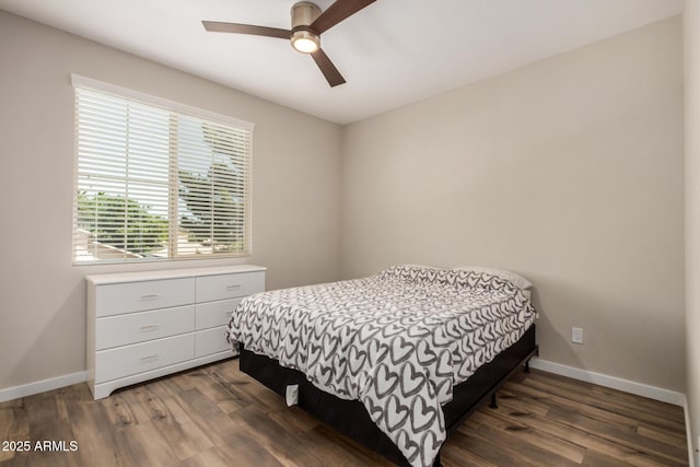 1153 W Diamondback Dr, Chandler, AZ 85286 - bedroom with dark wood-type flooring, baseboards, and a ceiling fan