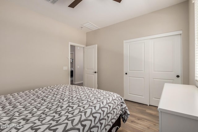 1153 W Diamondback Dr, Chandler, AZ 85286 - bedroom with wood finished floors, a closet, and a ceiling fan