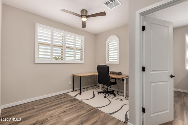 1153 W Diamondback Dr, Chandler, AZ 85286 - office area with wood finished floors, ceiling fan, and baseboards