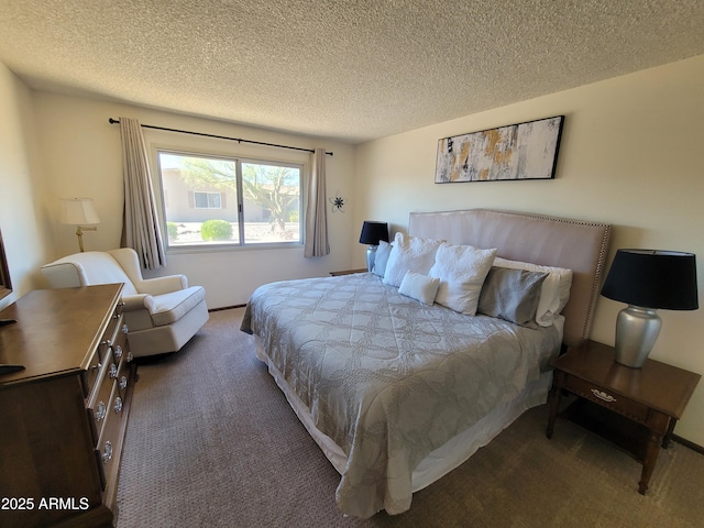 bedroom with carpet flooring and a textured ceiling