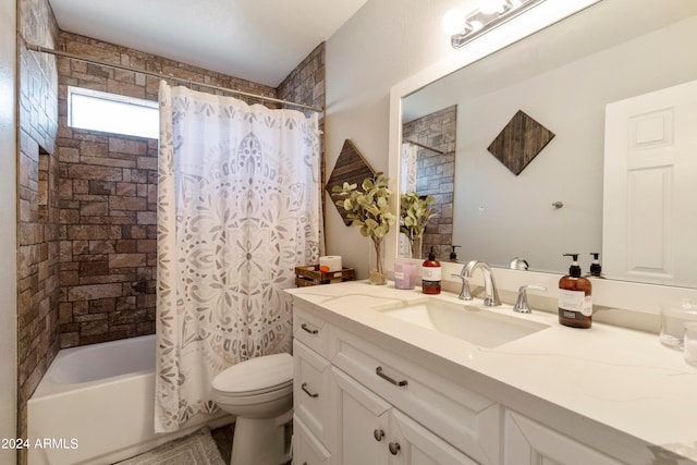 full bathroom with vanity, toilet, and shower / bath combo