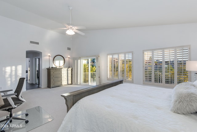 bedroom featuring high vaulted ceiling, ceiling fan, and carpet