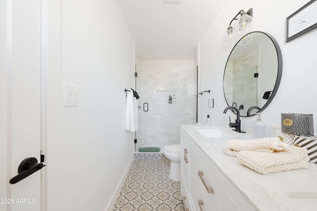 bathroom featuring walk in shower, vanity, and toilet