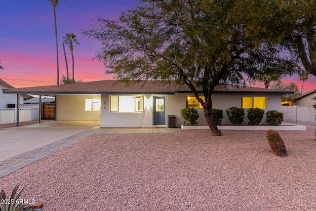 single story home with a carport