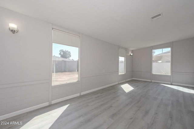 spare room featuring hardwood / wood-style flooring