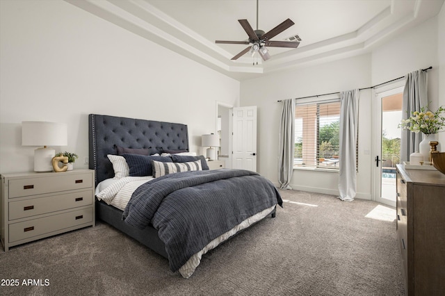 3946 N Pinnacle Hills Cir, Mesa, AZ 85207 - bedroom featuring carpet floors, a raised ceiling, access to exterior, and ceiling fan
