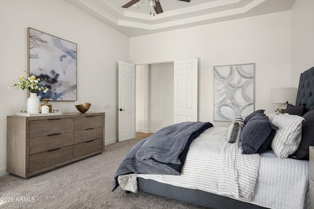 3946 N Pinnacle Hills Cir, Mesa, AZ 85207 - bedroom with light colored carpet, a raised ceiling, and ceiling fan
