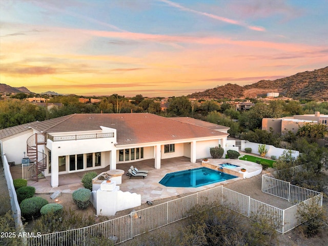 3946 N Pinnacle Hills Cir, Mesa, AZ 85207 - back of house featuring a patio area, a fenced backyard, and a mountain view