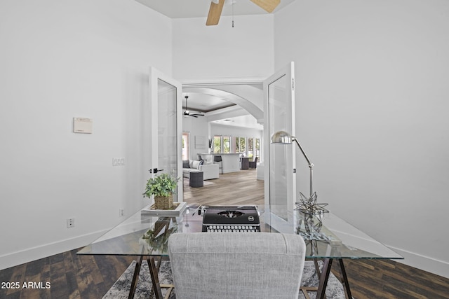 3946 N Pinnacle Hills Cir, Mesa, AZ 85207 - office featuring a ceiling fan, wood finished floors, and arched walkways