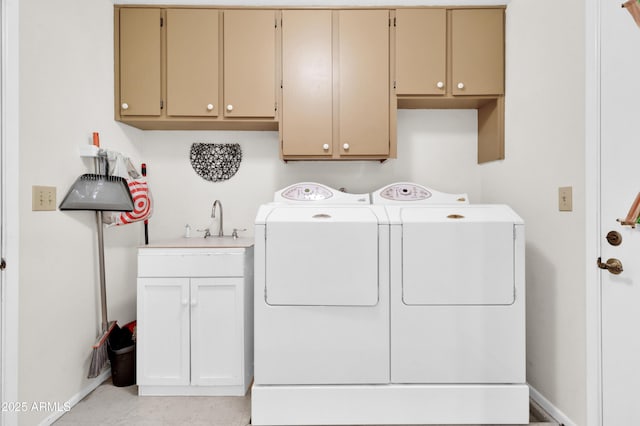 laundry room with cabinets and independent washer and dryer